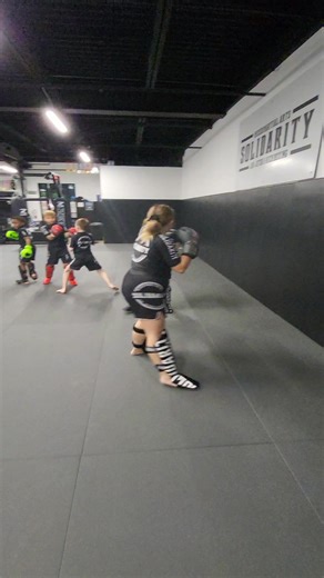 Here’s a look at our **kids’ sparring rounds** — and as you can see, everything is **controlled, light, and fully supervised.** Our coaches walk the mats the entire time, giving instruction, correcting technique, and making sure every student is safe. No one is ever left unattended. Sparring is important because it’s the **closest thing we have to real-world self-defense** in a safe, structured environment. But we do it *the right way.* Before we ever let the kids spar, we: ✔ **Drill for 40 minu
