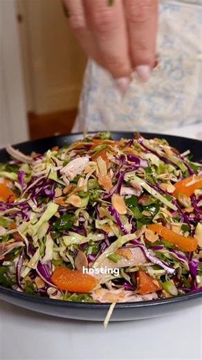 Violet Witchel on Instagram: "This crunchy almond cabbage salad is the perfect big game dish! California Almonds are the highlight of the salad giving it crunch and nutritional value with Vitamin E and Protein! #CaliforniaAlmondsPartner @californiaalmonds Recipe below • 1 ½ cups sliced California almonds • 4 cups shredded green cabbage • 2 cups shredded purple cabbage • One bunch of chopped cilantro • 1 bunch thinly sliced green onions • 1 rotisserie chicken, broken down • 3 oranges, sliced For 