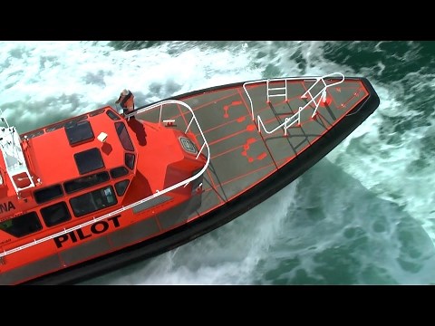 Pilots board cruise ships in choppy waters. Fast pilot boats. Auckland & Malta