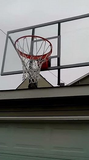 Roof mounted basketball hoop