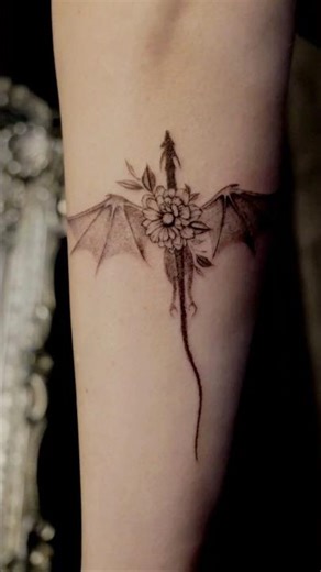 Delicate floral dragon for our client. #rudrainktattoostudioerina #dragontattoo #finelinetattoo