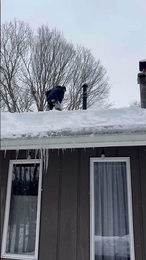 Clearing Snow on the Ridge Vent