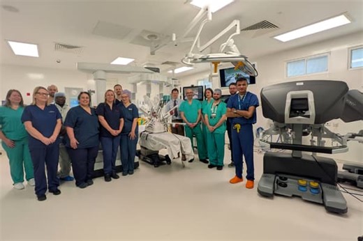 New surgical robot cuts its own ribbon as city unveils latest advance in cancer care