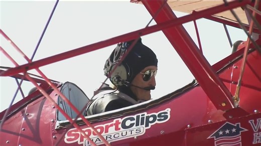 Four World War II heroes were flying again in an open cockpit biplane