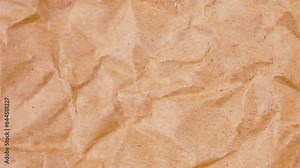 Stop motion of brown texture paper background. Crumpled Dirty Brown Paper. Looped Paper Animated Texture. Old paper texture background. Old Vintage color. Abstract grunge texture wall backdrop.
