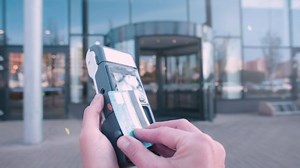 Contactless payment for bus services using credit card. Buying a ticket from the conductor at the bus stop. Using contactless payment card. Use of electronic money.