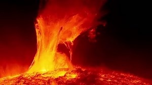 A close-up shot capturing the outburst of massive solar flares erupting from the sun. (Some elements furnished by NASA)