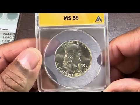 Coin collector in 2026 with a Dansco Album Update Franklin Half Dollars