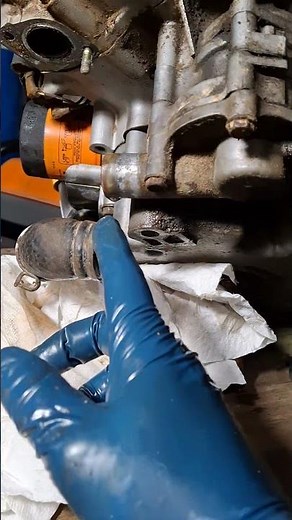 John Deere 345 Kawasaki FD590V engine removed and now removing water pump to replace gaskets