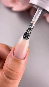 Holiday nails, but make them elegant ✨🎄 A sheer base, a snow-dust glitter fade, and the crispest white French — the ultimate December go-to. Featuring: 🤍Liquid Gel Polish 🤍CM Gel Art “White” 🤍Sky Dust gel “Glitter Freeze” 🤍No Wipe Gel Polish Smooth leveling, perfect glitter placement, and glossy Christmas shine. Shop the look via link in bio. ❄️✨ | LeChat Nail Care Products