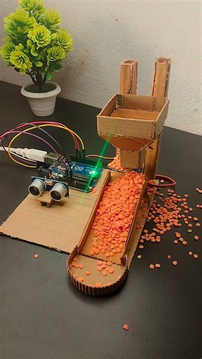 This Arduino Project Dispenses Food With Just a Hand Wave || #arduino #aielectric #smart
