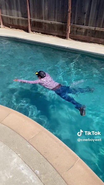 Buddy from Guatemala going down the water slide face first into the refreshing pool. Fully clothed with his worker gear! Nice break from hard work. #waterslide #honduran #honduras #wet #wetclothes #vaquero #wranglerjeans #wranglers #wrangler #wetfun