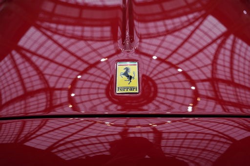 Ferrari reveals features of first fully electric vehicle, but its financial outlook mars the debut