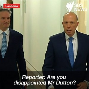 The moment Peter Dutton conceded defeat to Scott Morrison as they left the party room. http://bit.ly/2LlHSMR | SBS News