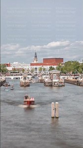 Timelapse view of boats passing through the Amstel locks on the Amstel River. Amsterdam, Netherlands