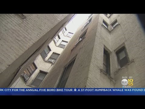 Woman Survives Fall From Roof Of 5-Story Building