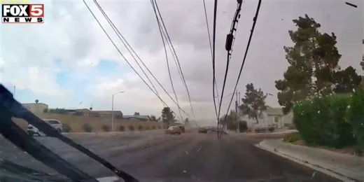 CAUGHT ON VIDEO: Power pole falls on top of car during storm in Las Vegas Valley