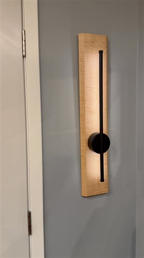 Custom-made rechargeable sconce lights. Available with different types of wood. These lights have four brightness levels and four color temperatures and can hang anywhere as they are rechargeable. | Painter Design Group