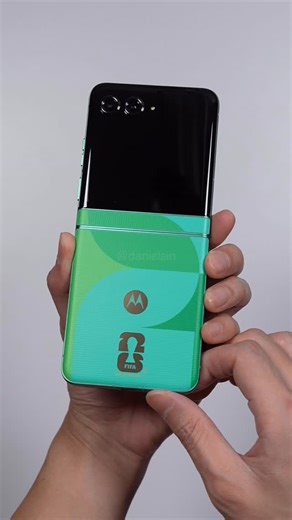 Daniel Sin on Instagram: "Moto RAZR FIFA World Cup Edition unboxing! There is a custom boot-up screen and theme for this phone. Would you pick this one up?"