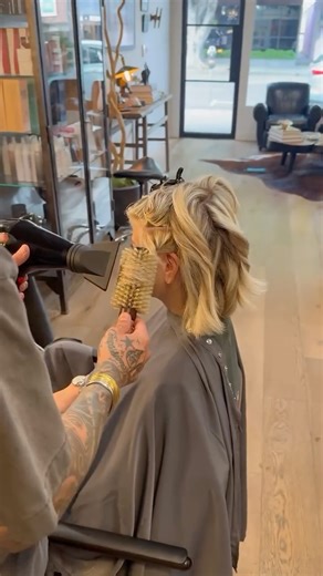 Dominick Serna on Instagram: "•Bobby tutorial• •cut the back into a concave shape to shape the neck nicely. And connect the sides to the guide in the back I have it a square shape so her front looked fuller •blowdry the hair straight the first couple sections to keep it nice and flat. From the nape up blowdry the hair waved with your @domdomhair boar/ nylon bristle brush. •I cut the shape into it after rounding out the layers to soften and not make her bob so heavy. •shake it out I used a textur