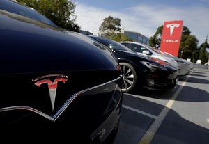 Tesla's Declining Favorability Will Likely Dent Deliveries, Revenue in 2025, Oppenheimer Says