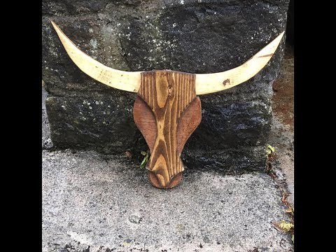 Making a wooden bull's head.
