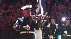 Marine Corps Master Gunnery Sergeant Peter Wilson performs the national anthem at the WVU basketball game. He is a Morgantown native and serves as the Whitehouse Violinist as a member of the Presidential Marine Orchestra. | The Exponent Telegram