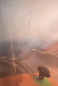 Farmer working to stop the spread of a wildfire. Watch wildfire videos at Wildfire HQ on YouTube. https://www.youtube.com/@WildfireHQ | Wildfire HQ