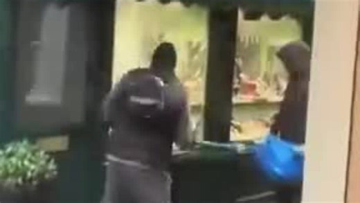 Brazen robbery: Masked men smash shop window in broad daylight
