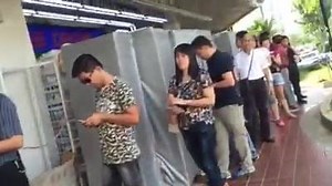S$13.9M JACKPOT: Massive queue at Block 211, Hougang Street 21, where last week's S$9.5m-winning TOTO ticket was sold. Read more: http://tdy.sg/1Lj4yH3 (Video: Don Wong/TODAY) | TODAY