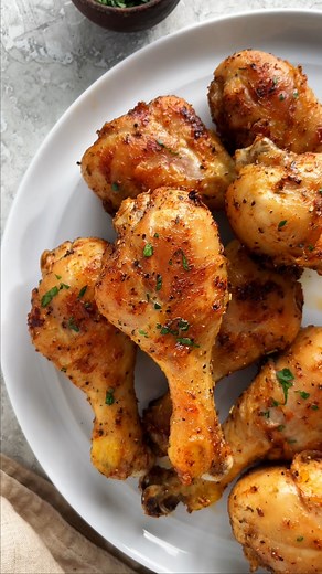 Here's how to make delicious and juicy baked chicken legs in this easy-to-follow recipe tutorial. Perfect for pairing with your favorite side dishes! https://www.jessicagavin.com/baked-chicken-legs/ | Jessica Gavin