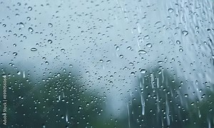 a water wet window weather transparent drip drops surface glass rain rainfall storm stormy falling condensation windshield backdrop light clear motion raindrop night background