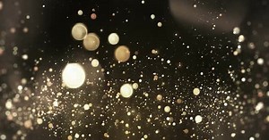 Golden Sparkling Glitter Particles Festive Background