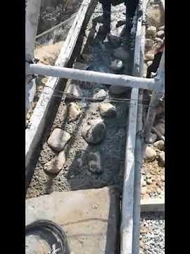 plum or Rubble or Cyclopean Concrete according to specifications.