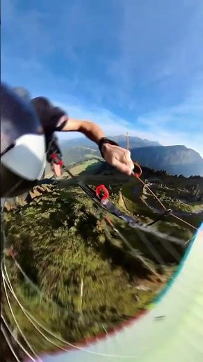 Breathtaking Paragliding Adventure Over Scenic Mountains