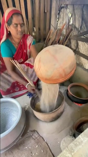 Basanti Boudi fries 1 maund of rice with her hands every day #shortvideo