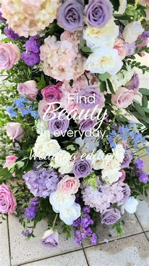 Find beauty in the everyday. ✨ This spring-inspired wedding embraced a romantic palette of purples, pinks, mauves, blues, and soft yellows. The reception glowed with candlelight—layered tapers and classic candelabras creating an atmosphere that felt intimate, timeless, and effortlessly beautiful. #everydaybeauty #creatorsearchinsights #weddings #weddinginspo #weddingflowers spring wedding florals, romantic wedding flowers, luxury wedding florist, candlelit wedding reception, garden style wedding