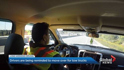 Drivers asked to ‘move over’ after 2 Toronto tow trucks struck by vehicles