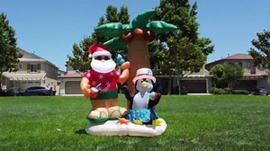 TWO CHRISTMAS PARTY DECORATIONS BUNDLE, Includes 7 Foot Inflatable Santa Claus and Penguin on an Island with Palm Tree, and 6 Foot Long Inflatable Nativity Scene with Three Kings Blowup with Lights