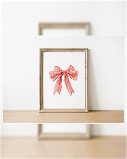 Ivy Sterling on Instagram: "Looking to elevate your space with a touch of elegance? 🎨✨ Introducing the Coral Bow Watercolor Print: Elegant Chic Wall Art! Transform any room into a serene sanctuary with this stunning digital download. Its vibrant hues and graceful design will infuse your daily routine with comfort and joy, making it the perfect addition to your home or office. 🏡🌸 For just $10.99, experience art that speaks to your style! Hurry, this chic masterpiece won’t last long—grab yours 
