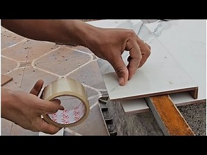 My first experience installing a door threshold this way with ceramic tiles.