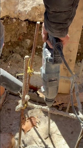 Drill using Bosch hammer drill to install a piece of rebar for the final concrete height #satisfying