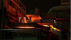 Continuous casting machine at the metallurgical plant - working process. Foundry ladle with liquid steel. Steel factory, metallurgical or metalworking mill