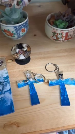 Marine Gift Shop on Instagram: "Our final Vendor Spotlight of 2025 is the incredibly talented resin artistry works from @createdfromthehardt! Did you know that every resin piece she designs she also sources? That means that each grain of sand, and every sea shell came directly from the beautiful Okinawan beaches. If you’re looking for the perfect unique gift to share a pice of Okinawa, look no further than here! You can find her pieces at MGS for the final time this year today from 10am-2pm. We’