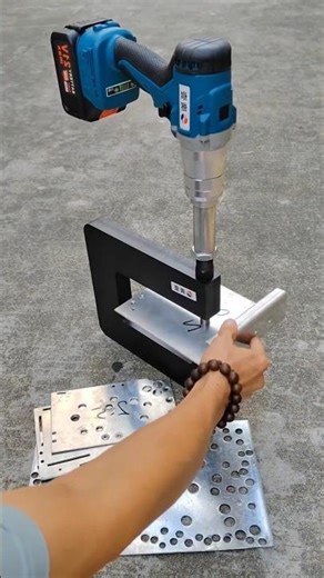 Punching Precise Holes in Steel Beams.