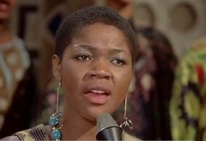 Letta Mbulu singing, with an African choir, "Nonqonqo" in “A Warm December”, 1973 ———————————————————————— #vintage #legend #moviestar #hollywoodgreats #1970s #silverscreen #goldenage #goldenageofhollywood #awarmdecember #retro #lettambulu #goodoldmovies #sidneypoitier #nonqonqo | Good Old Movies