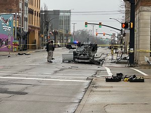 1 dead, 1 hurt after Muncie police chase ends with crash, flipped car; 1 suspect missing