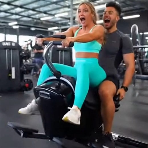 The Vibration on Instagram: "FITNESS COUPLE vs. BROKEN MACHINE 😱 Try Not To Laugh! (Gym Fail) We tried the viral "Tandem Horse Challenge" at the gym... and it went HORRIBLY wrong! 😂 Watch what happens when two fitness models try to look cool on a machine that decides to go into "Turbo Mode." Expectation: Aesthetic workout video. ✨ Reality: Pure chaotic slapstick. 💀 Even the "cool guy" couldn't handle the turbulence! Wait for the ending crash! (Don't worry, everyone is okay!) Hashtags: #GymFai