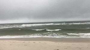 We are flying single red flags 🚩 in Orange Beach today - Saturday, December 2nd. Single red flags represent High Hazard with High Surf and Strong Currents. For your safety we ask that you stay on the shore. Rainy morning view: Cotton Bayou Beach. • Gulf temperature: 68 degrees • Surf conditions: Choppy with waves at 3 to 4 feet and west running currents. • Rip current forecast: Moderate Risk • Daily weather: Cloudy. Showers and a chance of thunderstorms with the high temperature in the lower 70