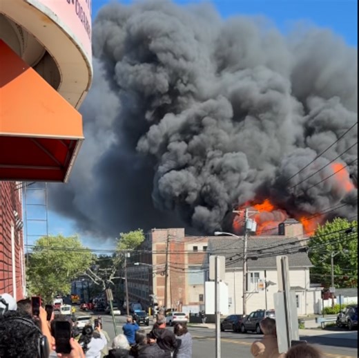 Massive N.J. warehouse fire spreads to other buildings, sends thick smoke across region